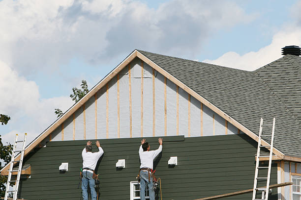 Professional Siding Installation technician working in Mathews, VA